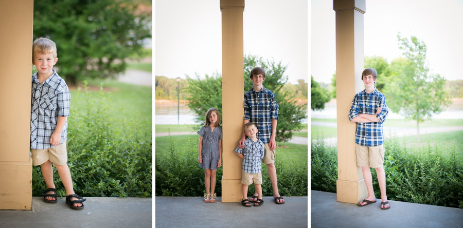 dad with kids standing by yellow post