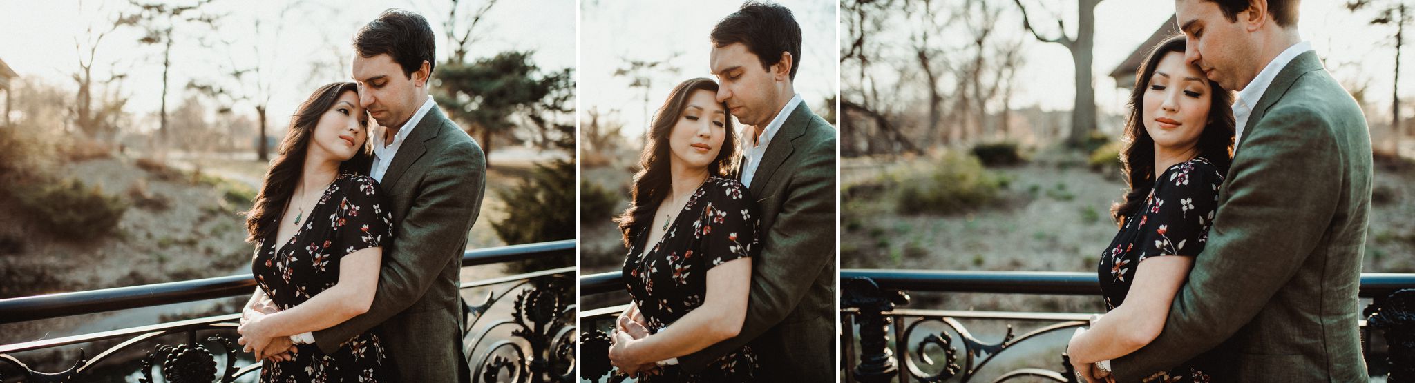 a man is embracing his fiancee on a wrought iron bridge during their Early Spring Lafayette Park Engagement Session